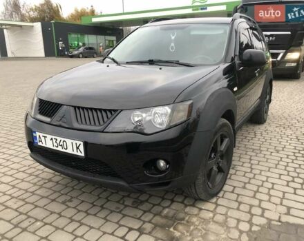 Чорний Міцубісі Аутлендер, об'ємом двигуна 2.4 л та пробігом 199 тис. км за 8999 $, фото 8 на Automoto.ua