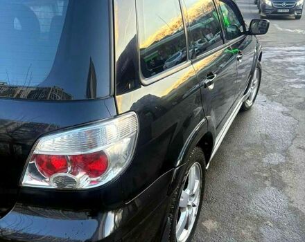 Черный Мицубиси Аутлендер, объемом двигателя 2.4 л и пробегом 231 тыс. км за 8500 $, фото 3 на Automoto.ua