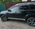 Чорний Міцубісі Аутлендер, об'ємом двигуна 2.4 л та пробігом 216 тис. км за 8500 $, фото 1 на Automoto.ua