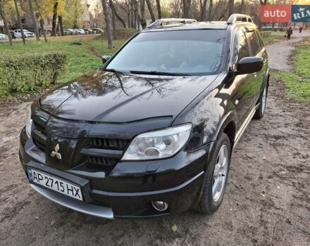 Чорний Міцубісі Аутлендер, об'ємом двигуна 2.38 л та пробігом 245 тис. км за 6800 $, фото 1 на Automoto.ua