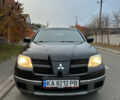 Мицубиси Аутлендер 2008 в Киеве на Automoto.ua Черный Мицубиси Аутлендер, объемом двигателя 2 л и пробегом 245 тыс. км за 5900 $, фото 1 на Automoto.ua