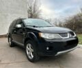 Чорний Міцубісі Аутлендер, об'ємом двигуна 2 л та пробігом 238 тис. км за 5500 $, фото 1 на Automoto.ua