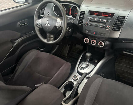 Черный Мицубиси Аутлендер, объемом двигателя 2.4 л и пробегом 199 тыс. км за 8777 $, фото 9 на Automoto.ua