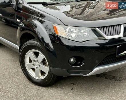 Черный Мицубиси Аутлендер, объемом двигателя 2.4 л и пробегом 185 тыс. км за 7900 $, фото 3 на Automoto.ua