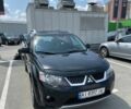 Чорний Міцубісі Аутлендер, об'ємом двигуна 2.4 л та пробігом 137 тис. км за 8999 $, фото 2 на Automoto.ua