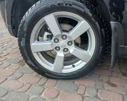 Чорний Міцубісі Аутлендер, об'ємом двигуна 3 л та пробігом 300 тис. км за 9600 $, фото 4 на Automoto.ua