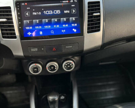 Чорний Міцубісі Аутлендер, об'ємом двигуна 2.4 л та пробігом 221 тис. км за 8900 $, фото 20 на Automoto.ua