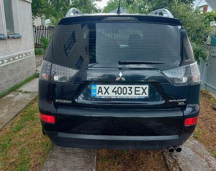 Чорний Міцубісі Аутлендер, об'ємом двигуна 3 л та пробігом 143 тис. км за 9500 $, фото 2 на Automoto.ua