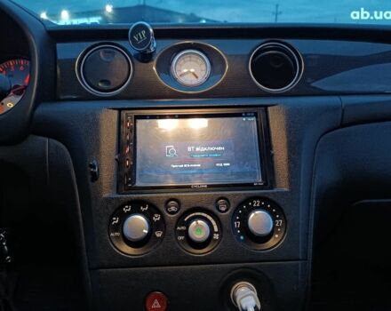 Черный Мицубиси Аутлендер, объемом двигателя 2 л и пробегом 271 тыс. км за 6940 $, фото 25 на Automoto.ua