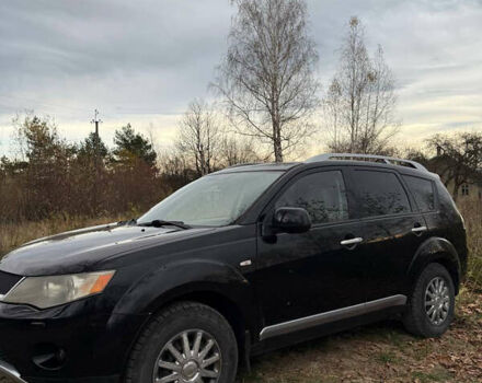 Черный Мицубиси Аутлендер, объемом двигателя 2.18 л и пробегом 233 тыс. км за 9600 $, фото 3 на Automoto.ua