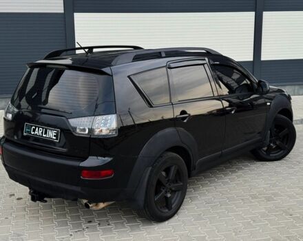 Черный Мицубиси Аутлендер, объемом двигателя 2.4 л и пробегом 199 тыс. км за 6470 $, фото 3 на Automoto.ua