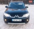 Чорний Міцубісі Аутлендер, об'ємом двигуна 2.4 л та пробігом 188 тис. км за 8700 $, фото 1 на Automoto.ua