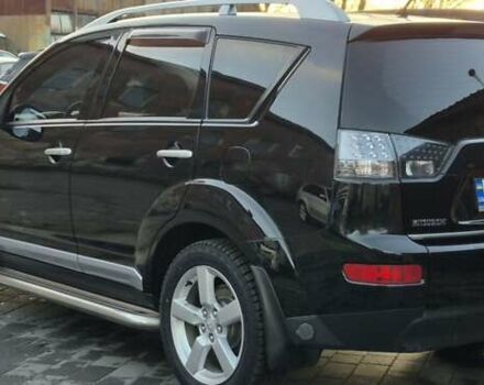 Чорний Міцубісі Аутлендер, об'ємом двигуна 2.4 л та пробігом 230 тис. км за 9700 $, фото 6 на Automoto.ua