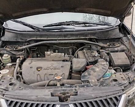 Чорний Міцубісі Аутлендер, об'ємом двигуна 2.36 л та пробігом 265 тис. км за 8800 $, фото 2 на Automoto.ua