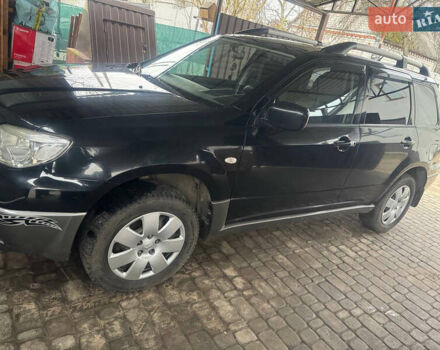 Черный Мицубиси Аутлендер, объемом двигателя 2 л и пробегом 130 тыс. км за 7500 $, фото 3 на Automoto.ua