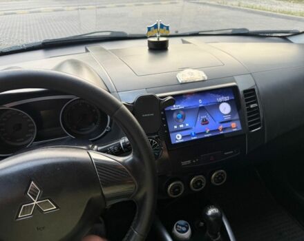 Черный Мицубиси Аутлендер, объемом двигателя 2.4 л и пробегом 369 тыс. км за 8500 $, фото 7 на Automoto.ua