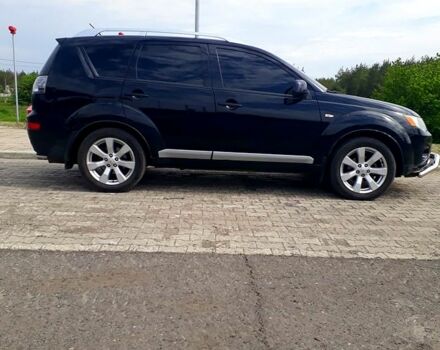 Черный Мицубиси Аутлендер, объемом двигателя 2.4 л и пробегом 180 тыс. км за 8900 $, фото 2 на Automoto.ua