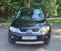 Черный Мицубиси Аутлендер, объемом двигателя 2.36 л и пробегом 412 тыс. км за 8700 $, фото 6 на Automoto.ua
