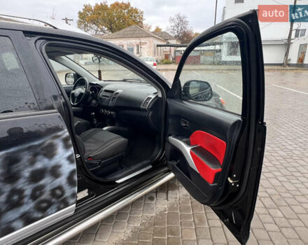 Черный Мицубиси Аутлендер, объемом двигателя 2.4 л и пробегом 230 тыс. км за 6650 $, фото 48 на Automoto.ua