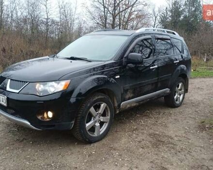 Черный Мицубиси Аутлендер, объемом двигателя 3 л и пробегом 152 тыс. км за 8700 $, фото 2 на Automoto.ua