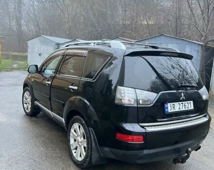 Чорний Міцубісі Аутлендер, об'ємом двигуна 2 л та пробігом 330 тис. км за 4900 $, фото 6 на Automoto.ua