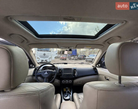 Черный Мицубиси Аутлендер, объемом двигателя 2.36 л и пробегом 286 тыс. км за 9200 $, фото 11 на Automoto.ua