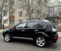 Черный Мицубиси Аутлендер, объемом двигателя 2 л и пробегом 377 тыс. км за 5200 $, фото 2 на Automoto.ua