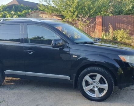 Чорний Міцубісі Аутлендер, об'ємом двигуна 2.4 л та пробігом 325 тис. км за 7500 $, фото 1 на Automoto.ua