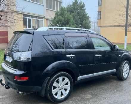 Чорний Міцубісі Аутлендер, об'ємом двигуна 2 л та пробігом 330 тис. км за 4900 $, фото 2 на Automoto.ua
