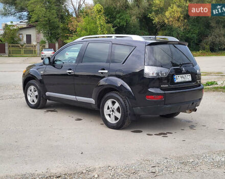 Чорний Міцубісі Аутлендер, об'ємом двигуна 2.4 л та пробігом 205 тис. км за 8400 $, фото 6 на Automoto.ua