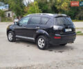 Чорний Міцубісі Аутлендер, об'ємом двигуна 2.4 л та пробігом 205 тис. км за 8400 $, фото 6 на Automoto.ua