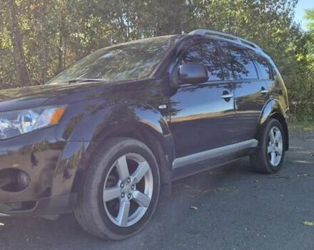 Черный Мицубиси Аутлендер, объемом двигателя 2.4 л и пробегом 178 тыс. км за 9150 $, фото 6 на Automoto.ua