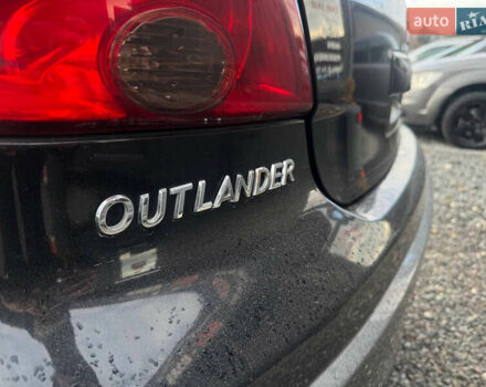 Черный Мицубиси Аутлендер, объемом двигателя 2 л и пробегом 240 тыс. км за 5500 $, фото 24 на Automoto.ua