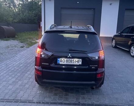 Черный Мицубиси Аутлендер, объемом двигателя 2.4 л и пробегом 290 тыс. км за 9500 $, фото 9 на Automoto.ua