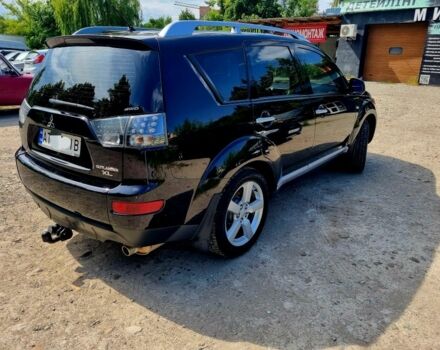 Черный Мицубиси Аутлендер, объемом двигателя 2.4 л и пробегом 234 тыс. км за 9800 $, фото 3 на Automoto.ua