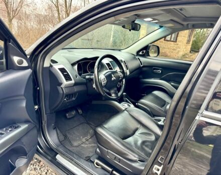 Чорний Міцубісі Аутлендер, об'ємом двигуна 2.4 л та пробігом 229 тис. км за 9790 $, фото 9 на Automoto.ua