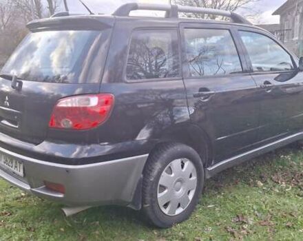 Міцубісі Аутлендер 2008 у Галиче на Automoto.ua Чорний Міцубісі Аутлендер, об'ємом двигуна 2 л та пробігом 112 тис. км за 7350 $, фото 3 на Automoto.ua