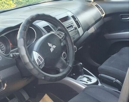 Чорний Міцубісі Аутлендер, об'ємом двигуна 2.4 л та пробігом 325 тис. км за 7500 $, фото 7 на Automoto.ua