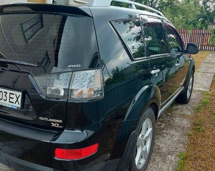 Чорний Міцубісі Аутлендер, об'ємом двигуна 3 л та пробігом 143 тис. км за 9500 $, фото 3 на Automoto.ua