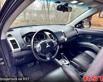 Черный Мицубиси Аутлендер, объемом двигателя 2.4 л и пробегом 229 тыс. км за 9790 $, фото 9 на Automoto.ua