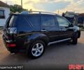 Черный Мицубиси Аутлендер, объемом двигателя 2.4 л и пробегом 189 тыс. км за 7000 $, фото 4 на Automoto.ua