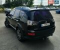 Черный Мицубиси Аутлендер, объемом двигателя 3 л и пробегом 317 тыс. км за 8900 $, фото 4 на Automoto.ua