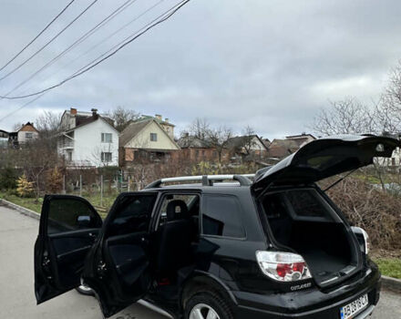 Чорний Міцубісі Аутлендер, об'ємом двигуна 2 л та пробігом 118 тис. км за 8100 $, фото 40 на Automoto.ua