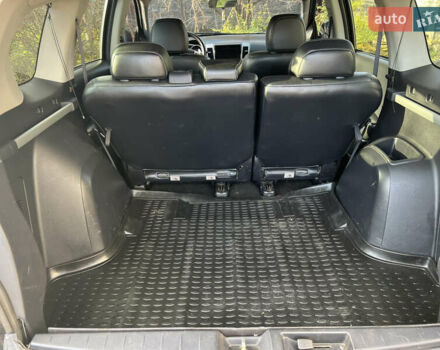 Чорний Міцубісі Аутлендер, об'ємом двигуна 2.4 л та пробігом 221 тис. км за 8700 $, фото 28 на Automoto.ua