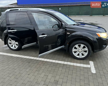 Черный Мицубиси Аутлендер, объемом двигателя 1.97 л и пробегом 244 тыс. км за 8800 $, фото 7 на Automoto.ua