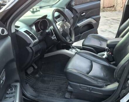 Чорний Міцубісі Аутлендер, об'ємом двигуна 2.4 л та пробігом 230 тис. км за 9700 $, фото 12 на Automoto.ua