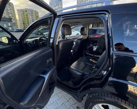 Черный Мицубиси Аутлендер, объемом двигателя 1.97 л и пробегом 202 тыс. км за 9700 $, фото 7 на Automoto.ua