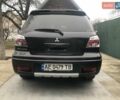 Чорний Міцубісі Аутлендер, об'ємом двигуна 2.38 л та пробігом 207 тис. км за 7000 $, фото 30 на Automoto.ua