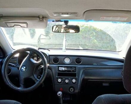 Черный Мицубиси Аутлендер, объемом двигателя 2 л и пробегом 240 тыс. км за 6500 $, фото 3 на Automoto.ua