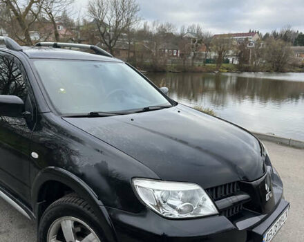 Чорний Міцубісі Аутлендер, об'ємом двигуна 2 л та пробігом 118 тис. км за 8100 $, фото 5 на Automoto.ua
